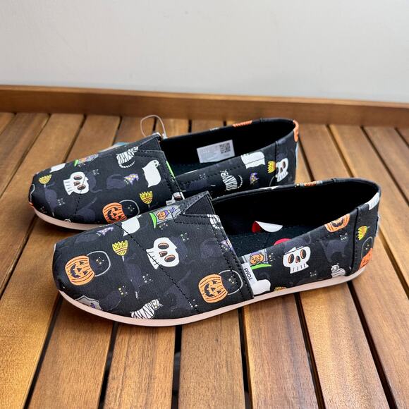 Toms Shoes - NWT TOMS Halloween Pumpkins Black Cats Skulls Slip On Shoes Black Size 6